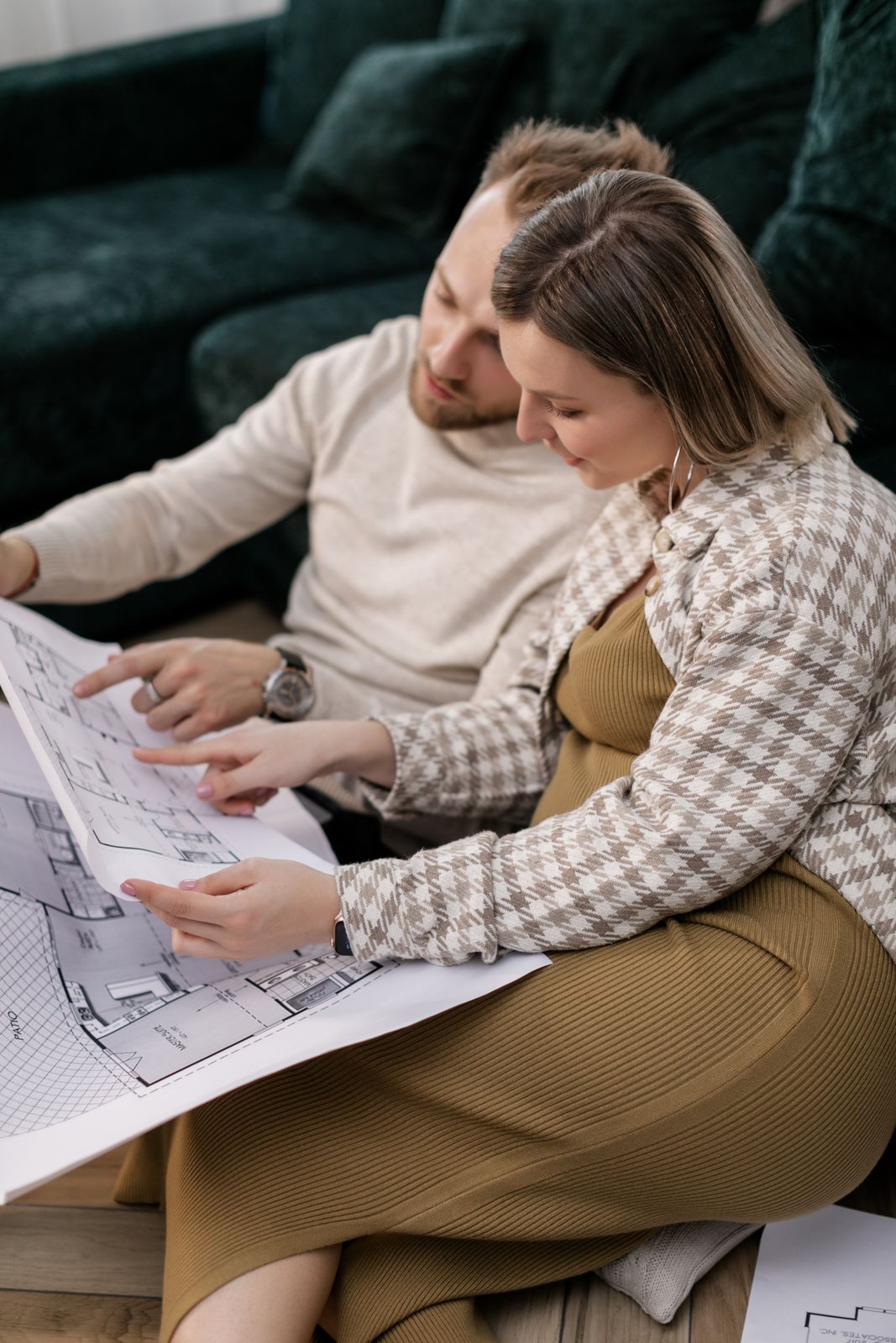 Woman reviewing papers while planning a budget at home