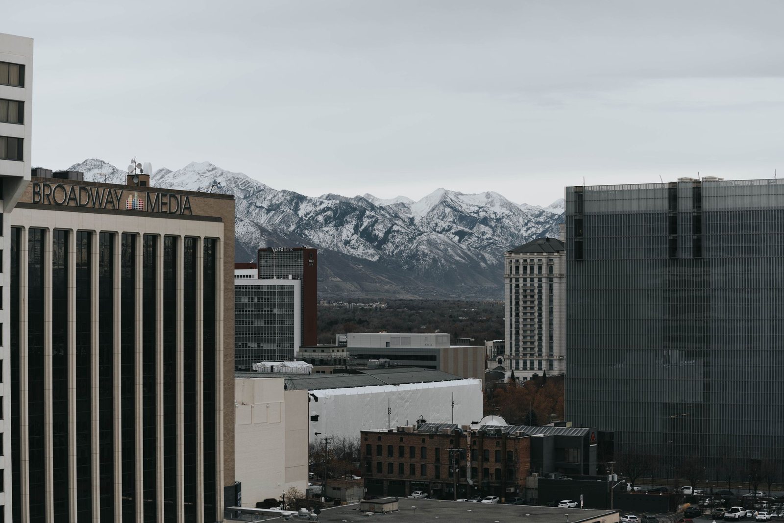 Downtown Salt Lake City buildings with the Wasatch Mountains behind them